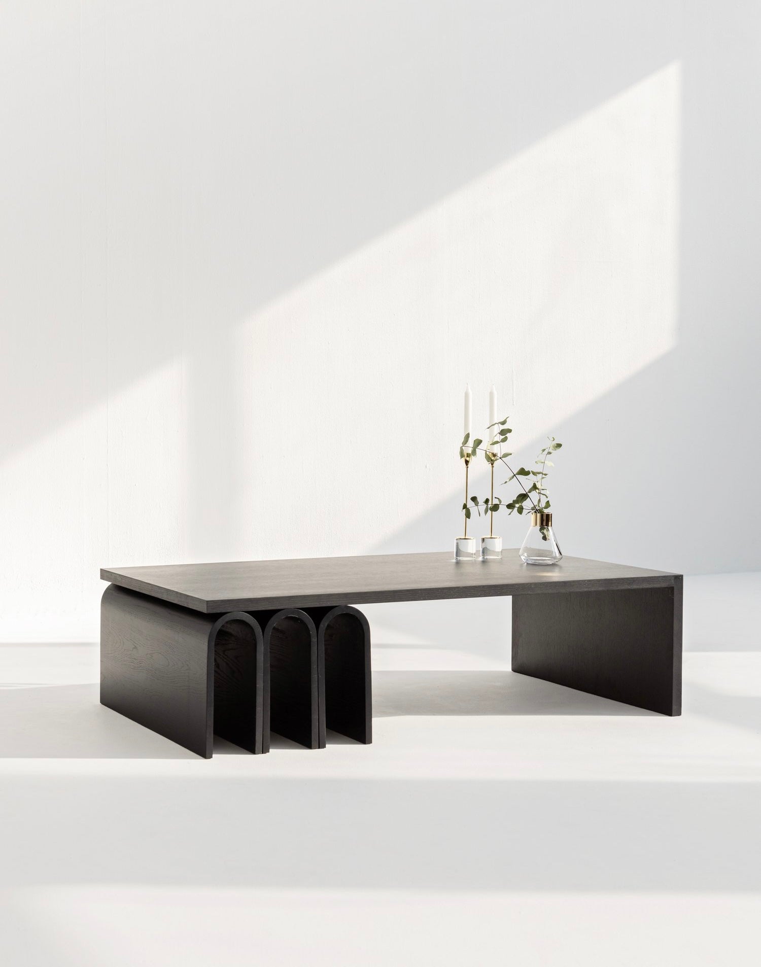 Modern coffee table with a minimalist design on a white background