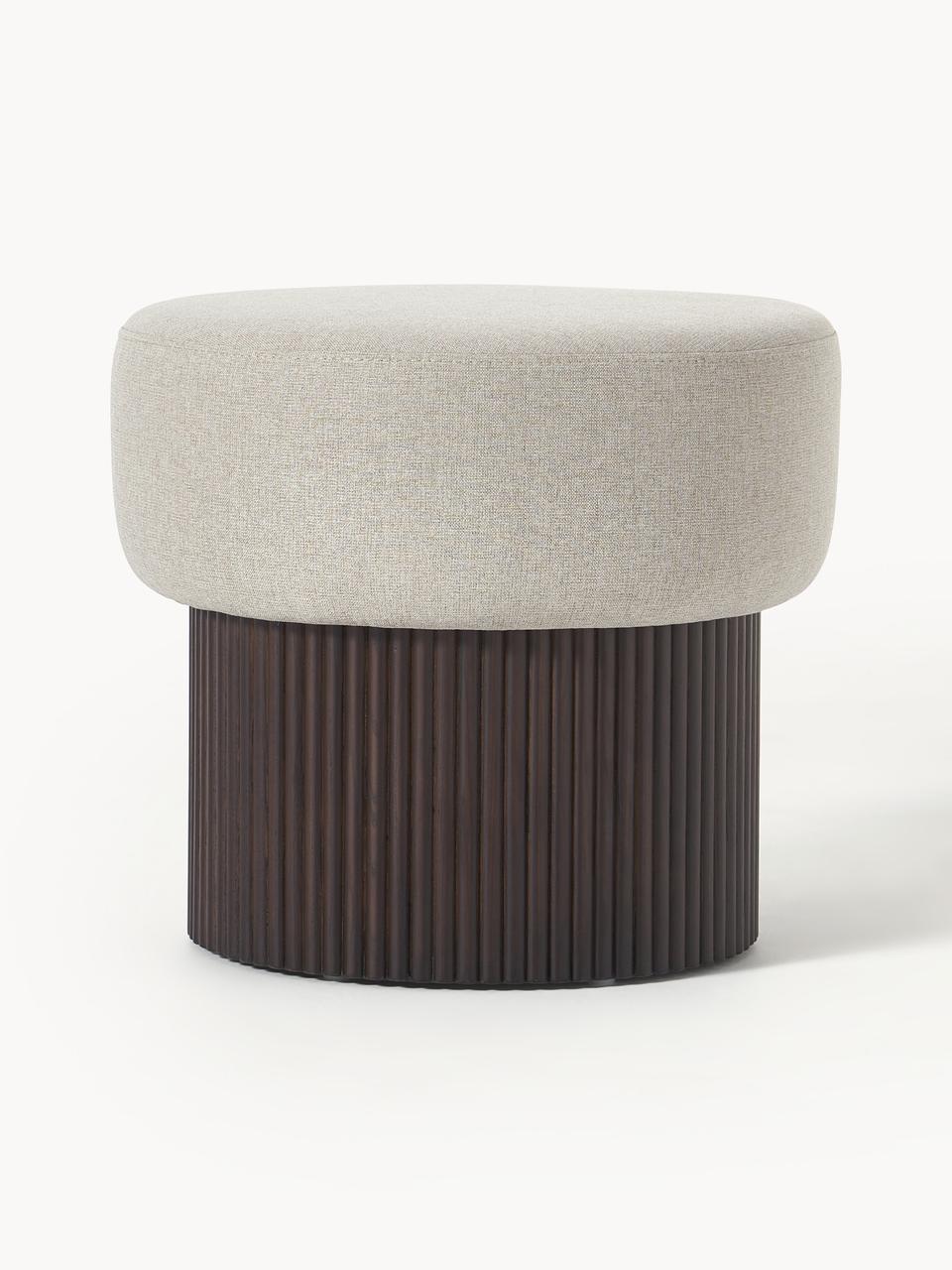 Beige ottoman with ribbed brown base on a white background