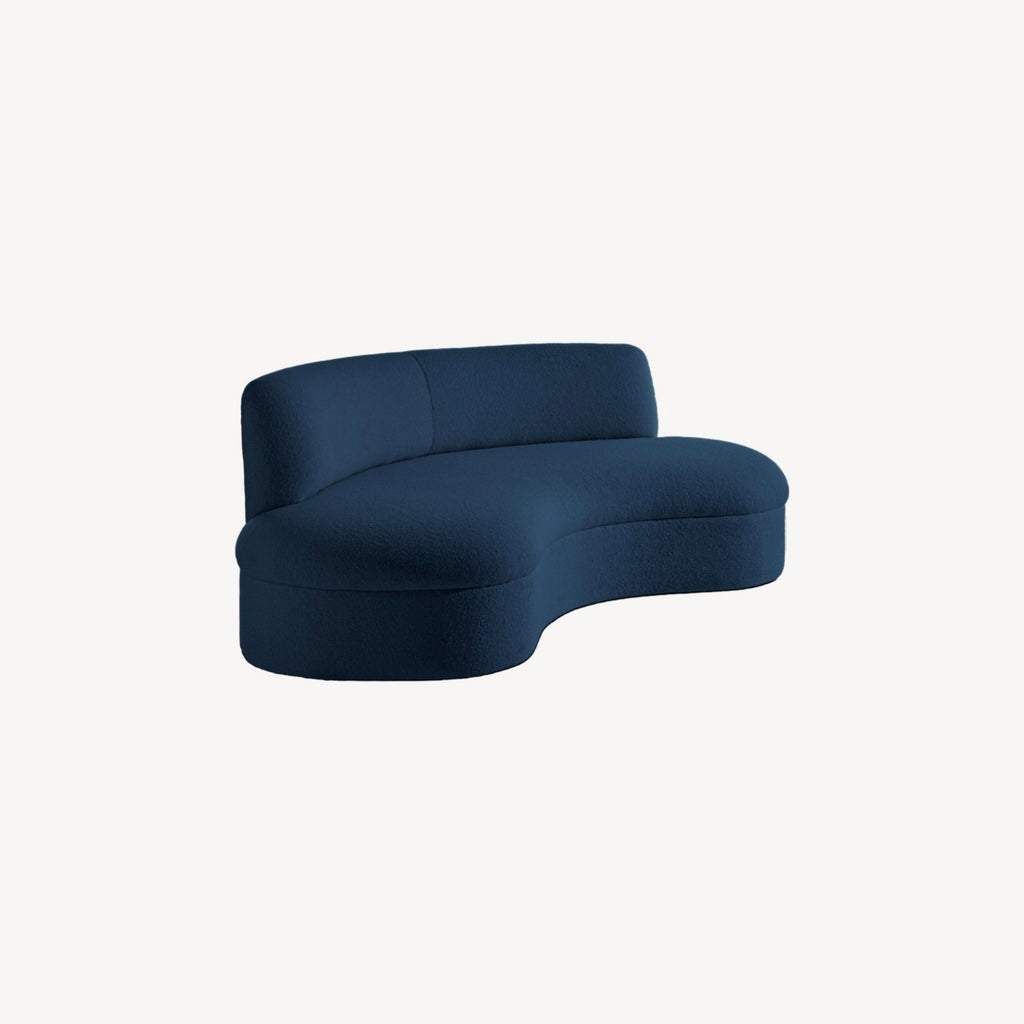 Modern blue sofa on a white background