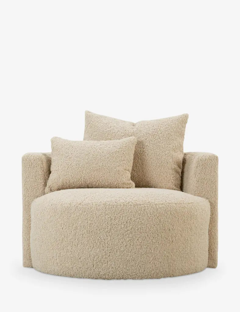 Beige armchair with two cushions on a white background