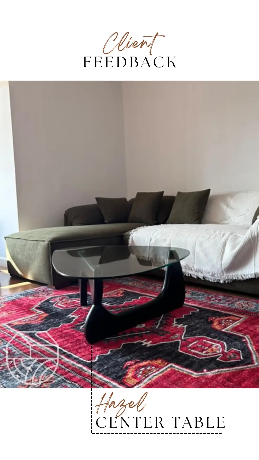 Modern living room with a glass center table on a patterned rug, featuring 'Hazel Center Table' branding.