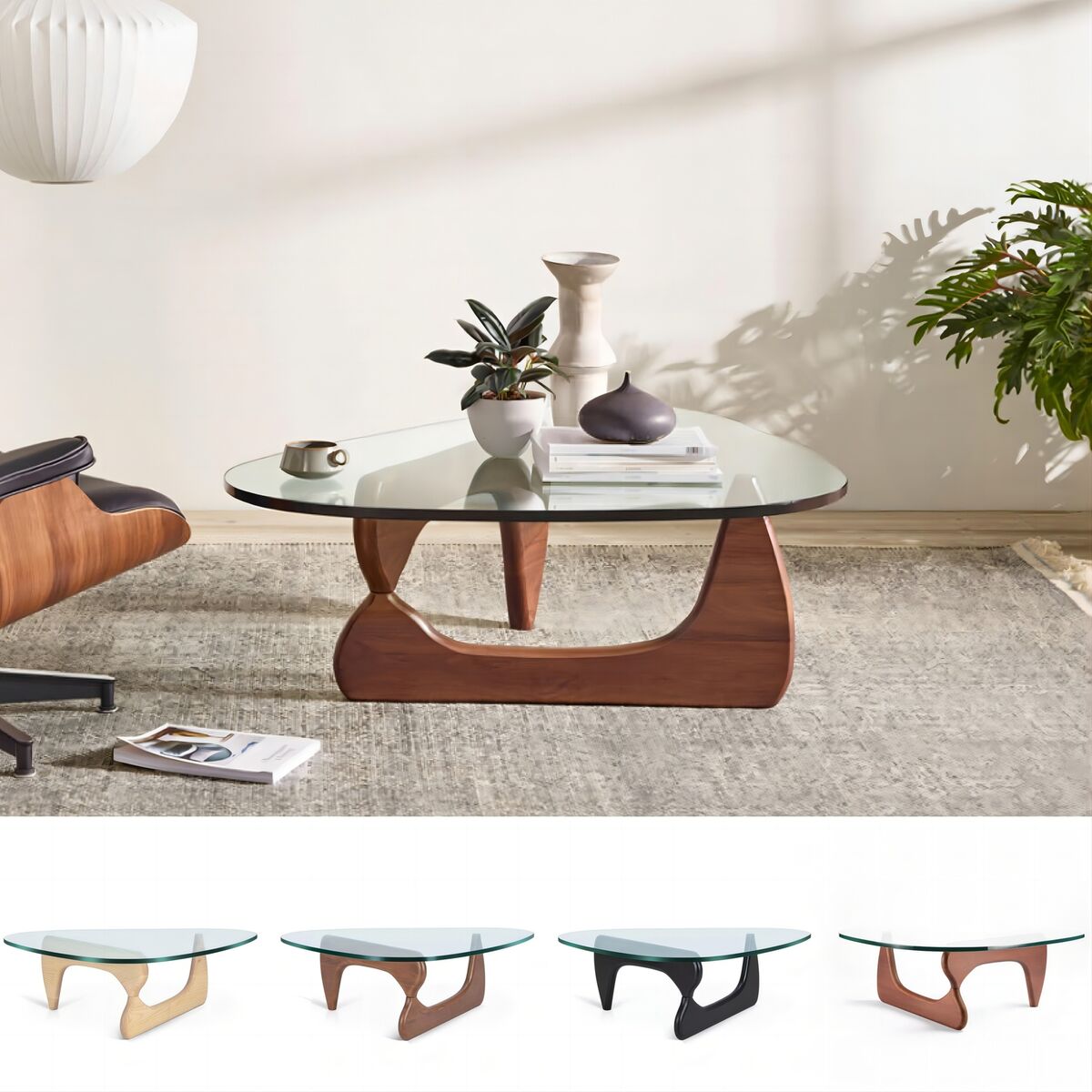 Modern coffee table with glass top and wooden base in a living room setting.