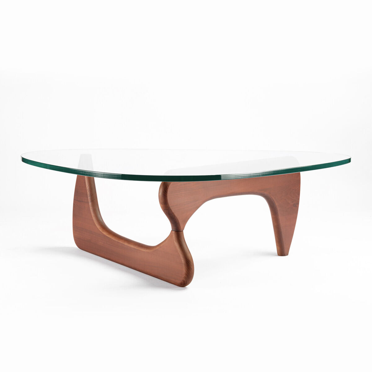Modern coffee table with glass top and wooden base on a white background