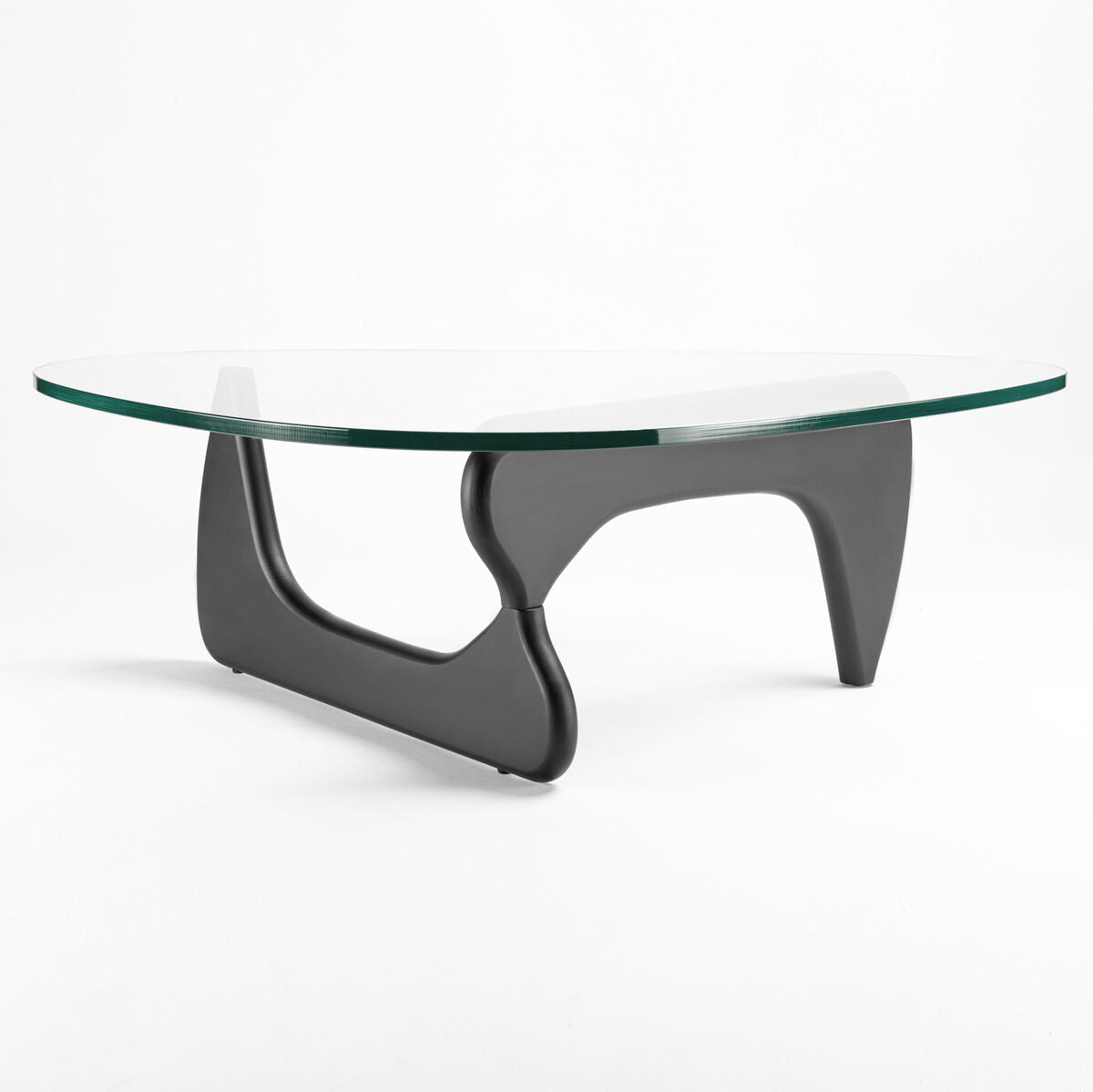 Modern glass coffee table with black base on a white background