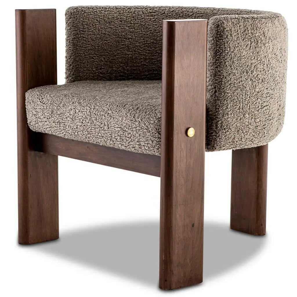 Chair with brown wooden frame and textured gray cushion on a white background