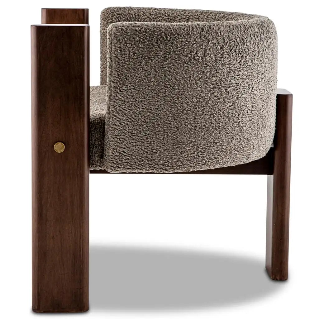 Chair with wooden frame and gray cushion on a white background