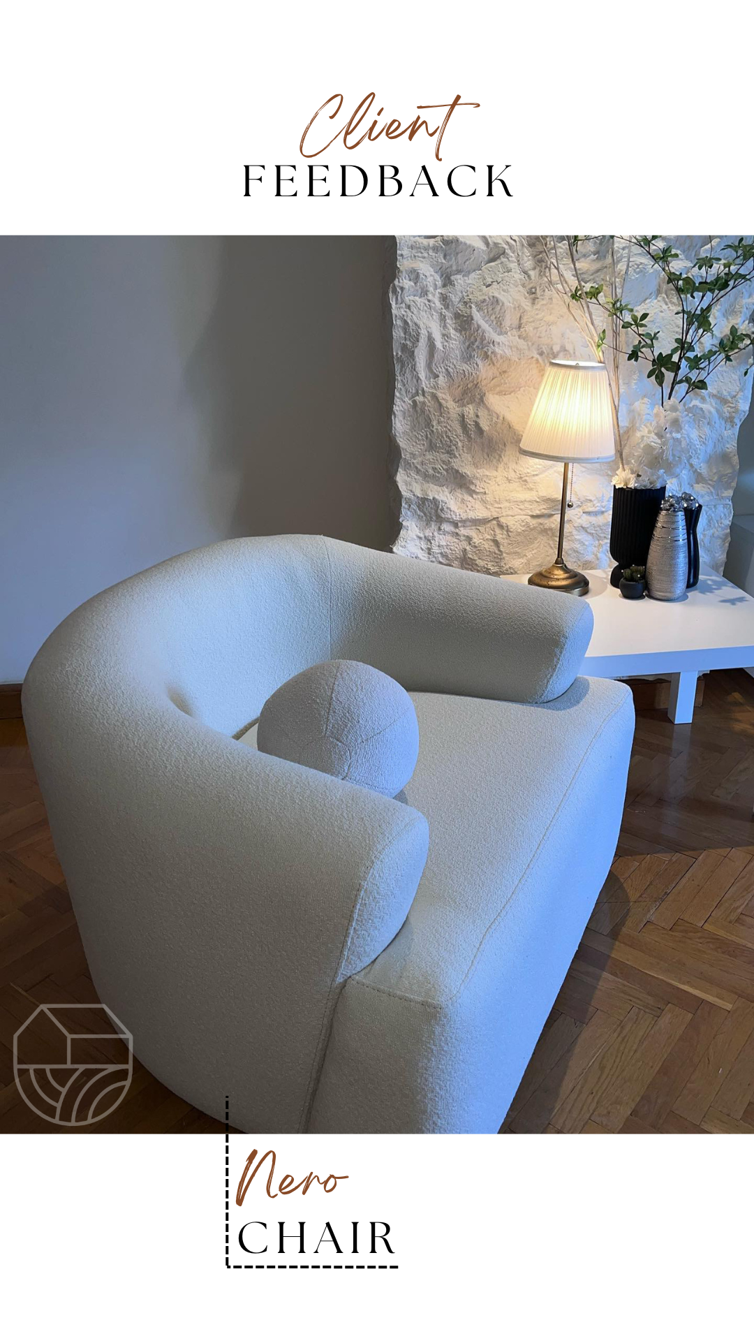 White chair in a room with a lamp and decorative items on a table.