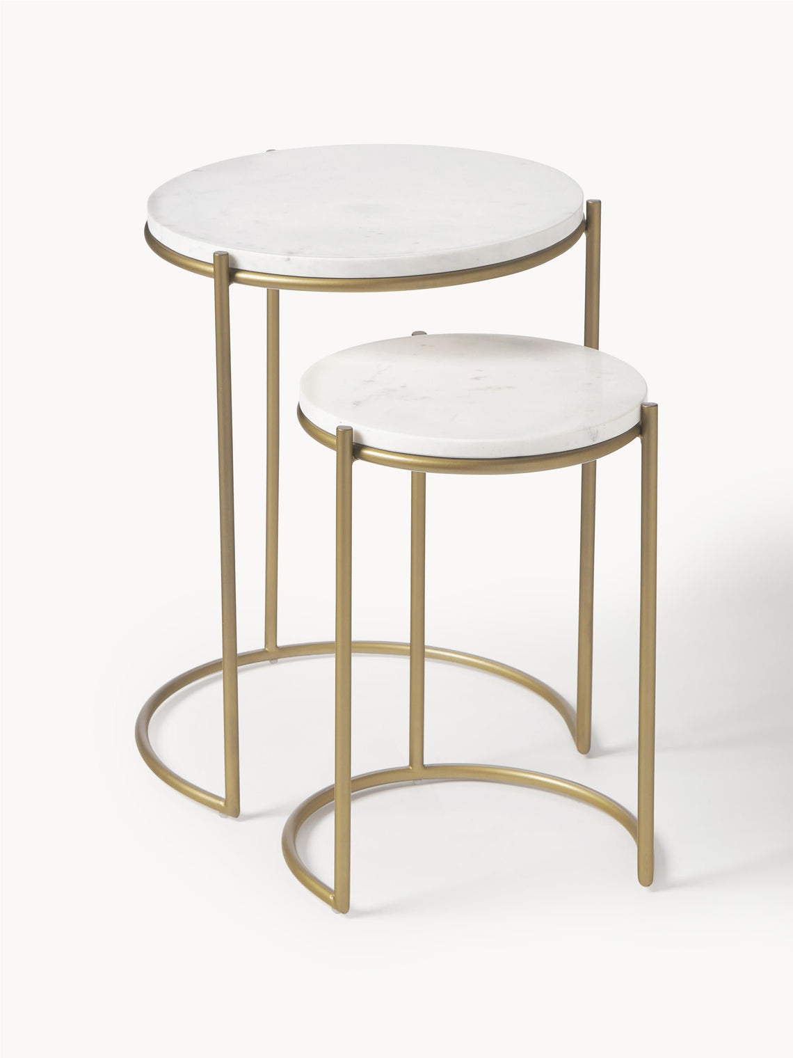 Set of two round side tables with gold frames and white marble-like tops on a white background