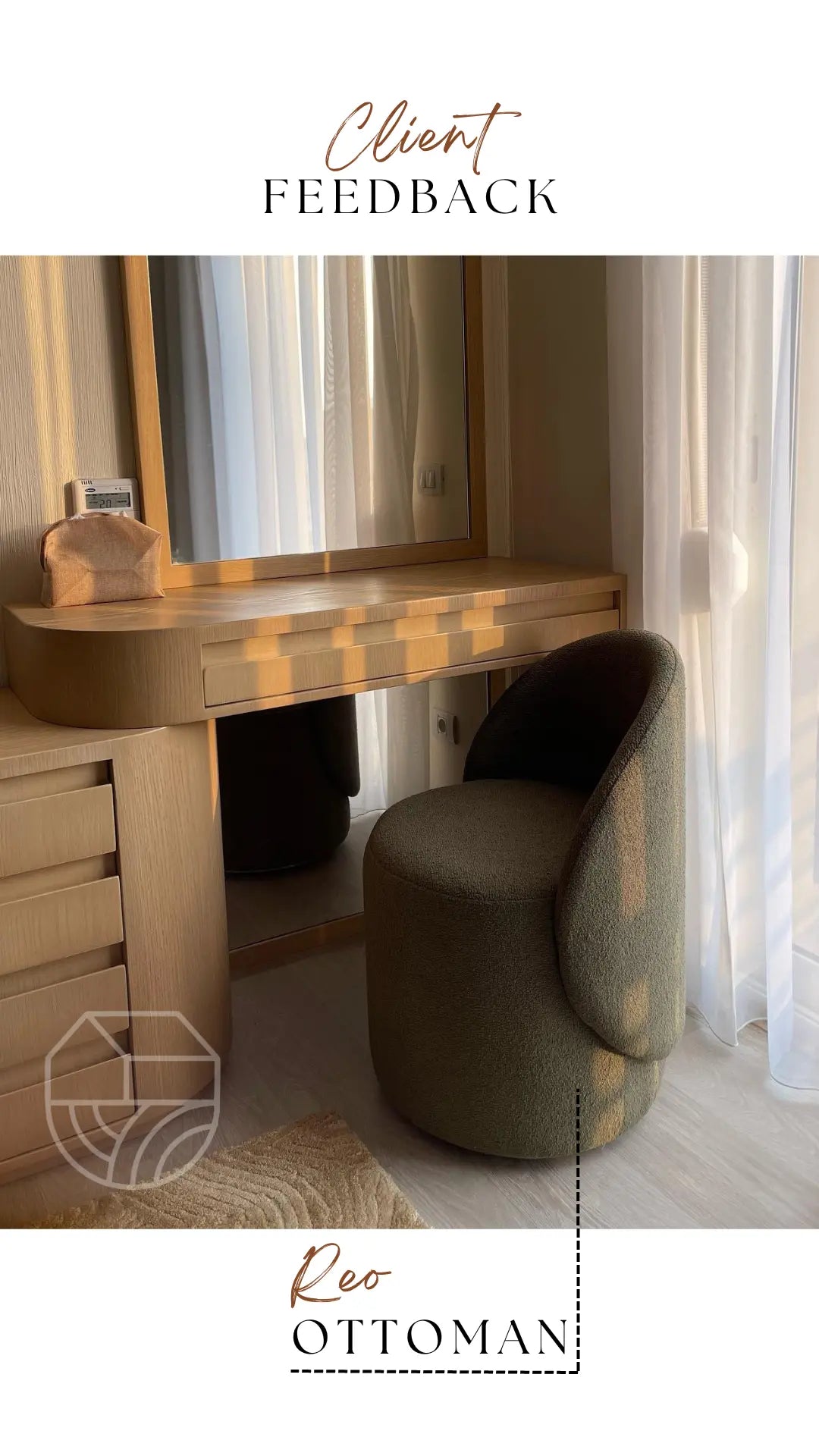 Dressing table with a mirror and a dark green ottoman in a room.